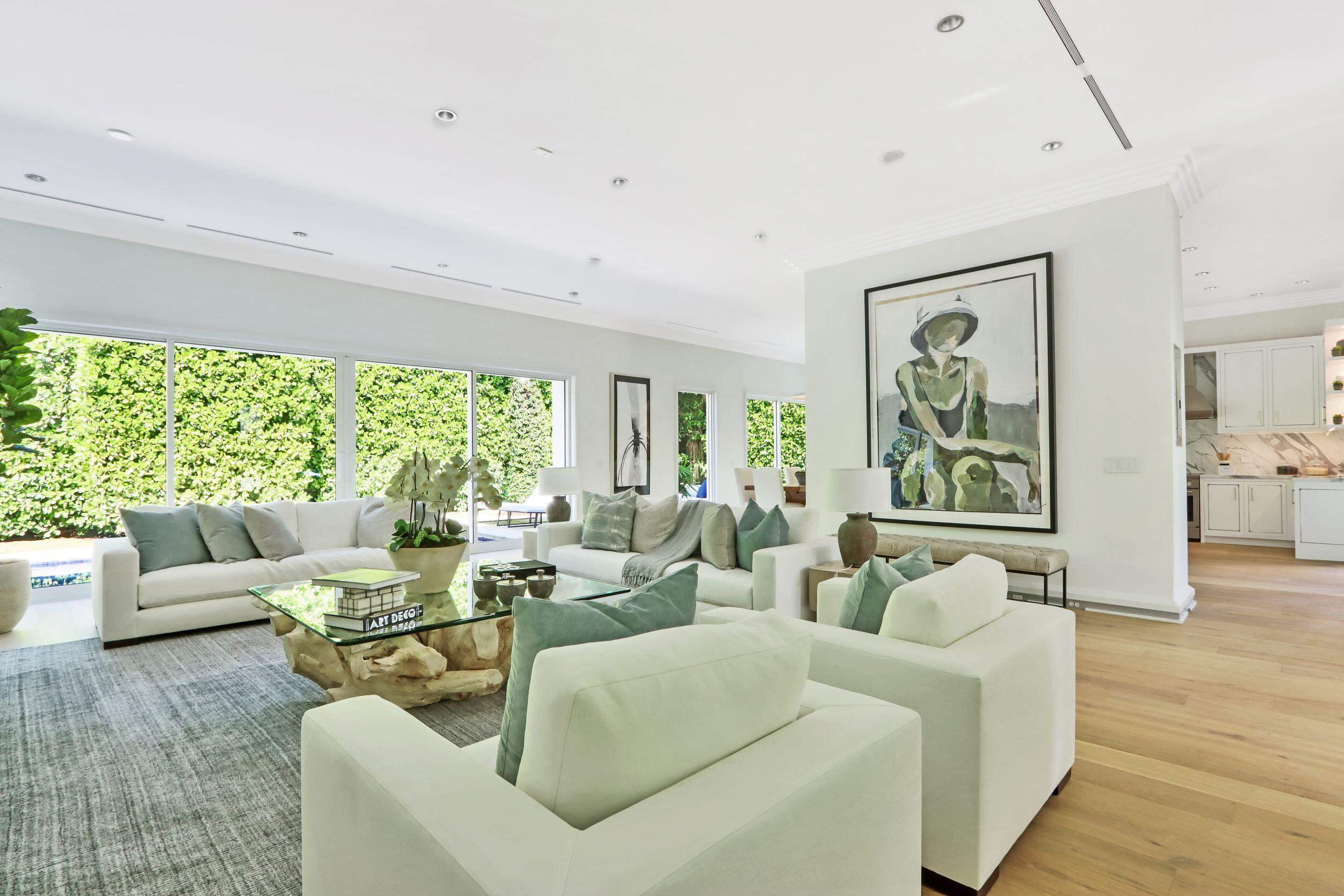 215 Indian Road Palm Beach, FL 33480 - Photo 4 of 33 a living room with furniture and a large window