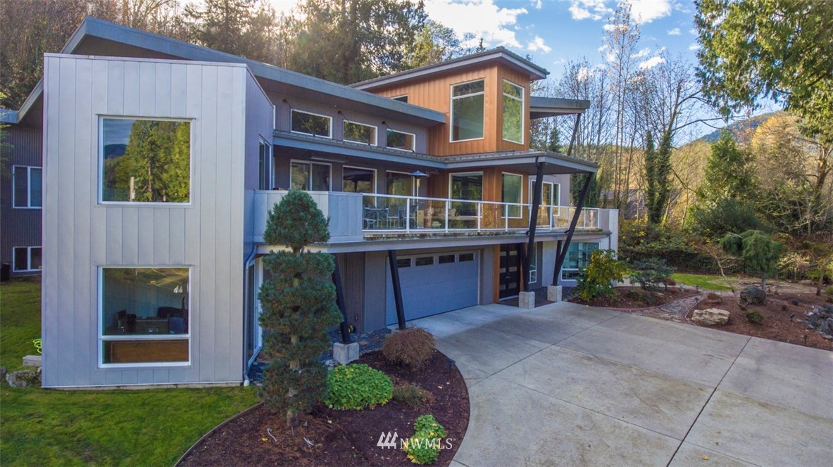 1333 Roy Road Bellingham, WA 98229 - Photo 2 of 37 a front view of a house with a garden