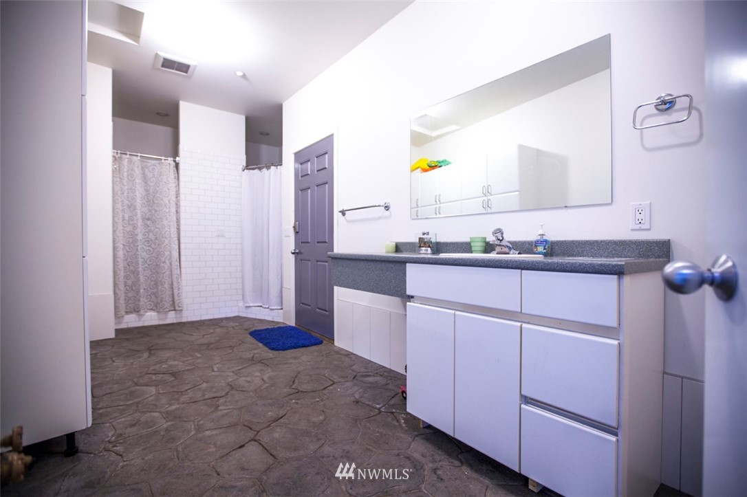 1333 Roy Road Bellingham, WA 98229 - Photo 11 of 37 a bathroom with a sink and a mirror