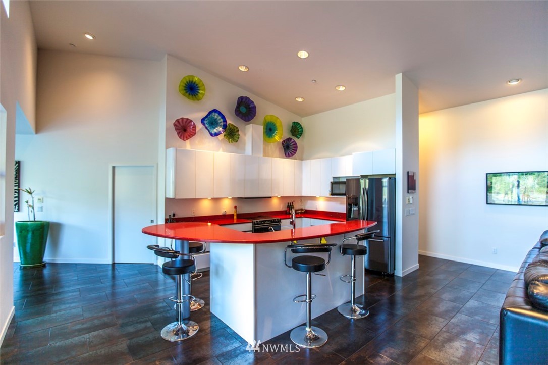 1333 Roy Road Bellingham, WA 98229 - Photo 18 of 37 a room with furniture and wooden floor