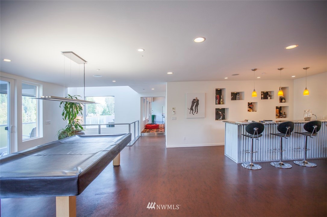 1333 Roy Road Bellingham, WA 98229 - Photo 26 of 37 a living room with furniture and a wooden floor
