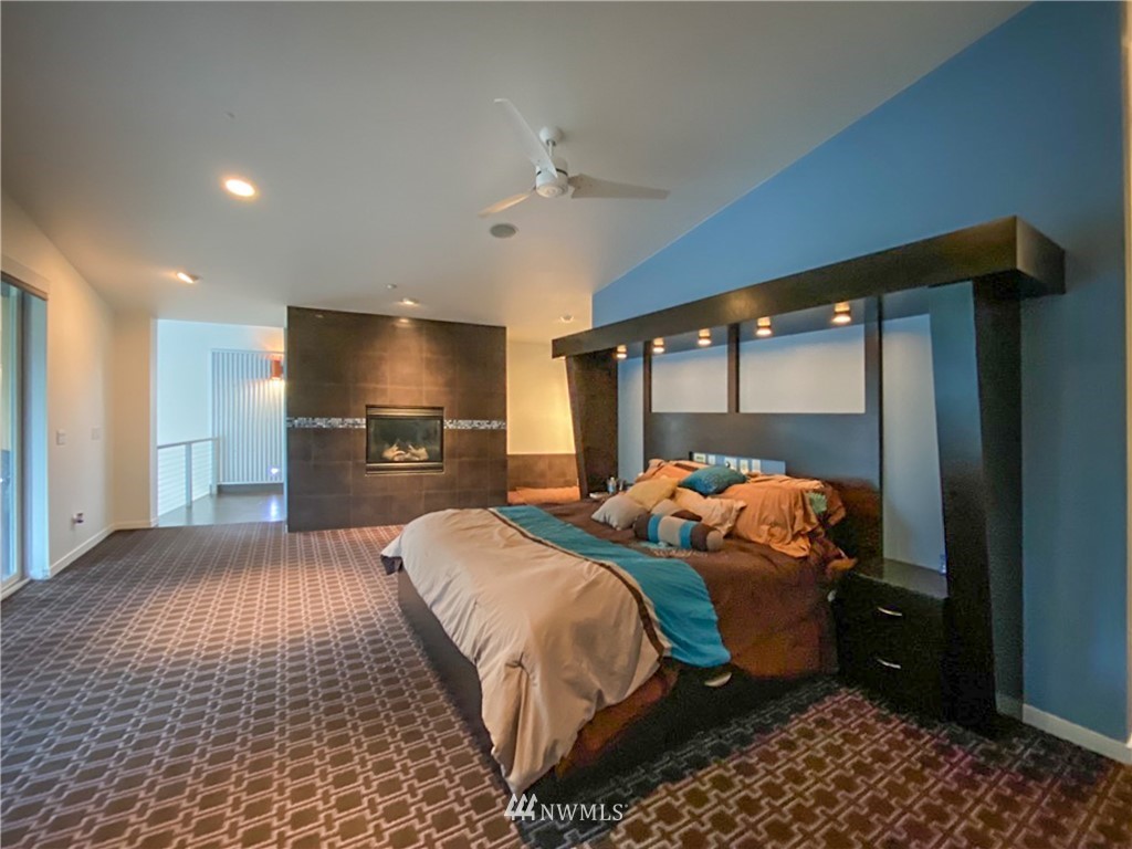 1333 Roy Road Bellingham, WA 98229 - Photo 30 of 37 a bedroom with a bed and a mirror