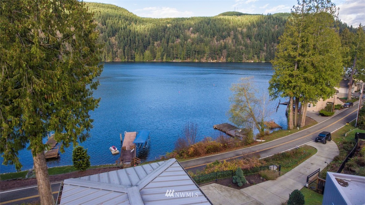1333 Roy Road Bellingham, WA 98229 - Photo 6 of 37 a view of a house with a backyard and a garden