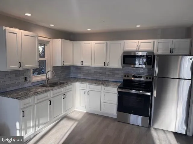 a view of a wooden fence