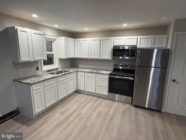 a view of lot of cabinets