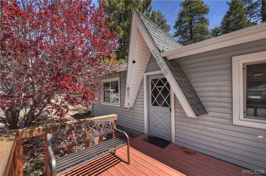 1099 Canyon Road Fawnskin, CA 92333 - Photo 6 of 39 a view of a house with a deck
