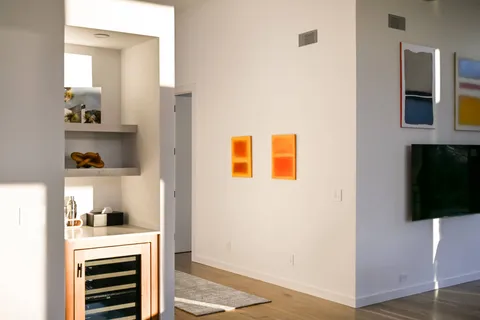 a living room with a couch and a flat screen tv