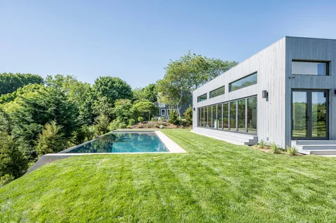 a view of a backyard with a garden