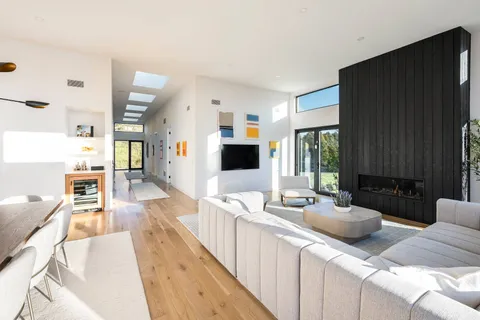 a kitchen with stainless steel appliances granite countertop a stove and a refrigerator