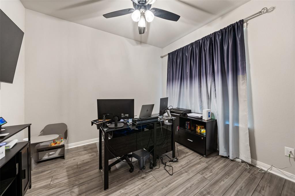 3525 Beutel Road Lorena, TX 76655 - Photo 14 of 34 a view of a workspace with furniture and wooden floor
