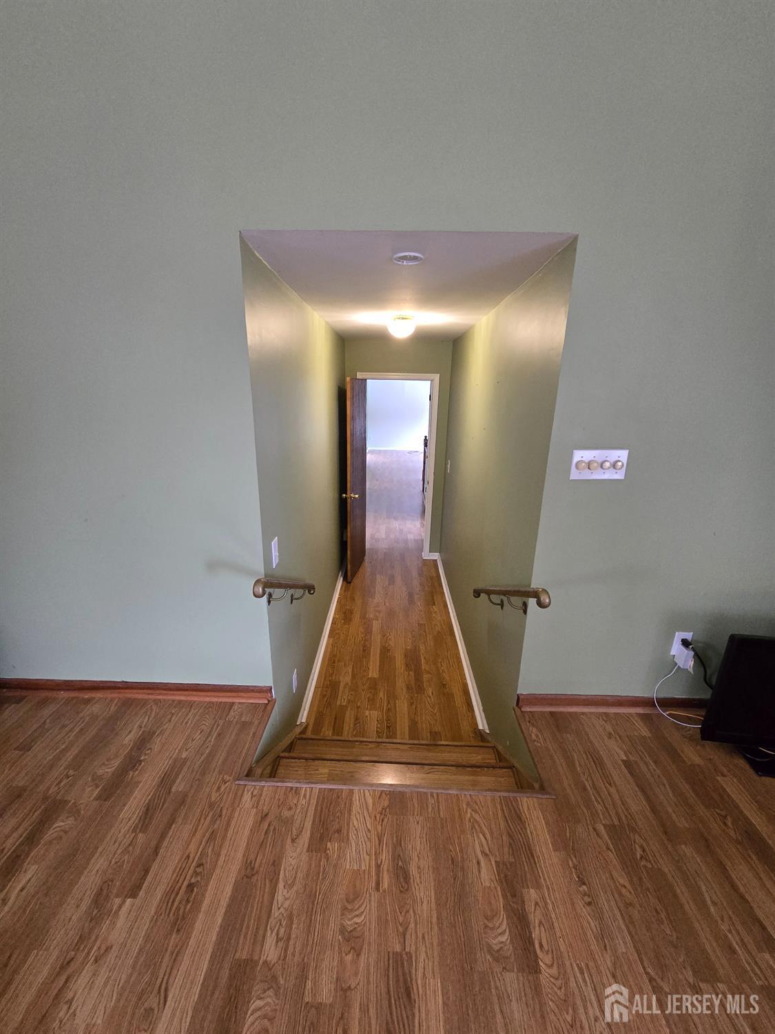 241 Monmouth Road Freehold, NJ 07728 - Photo 22 of 30 wooden floor in a room
