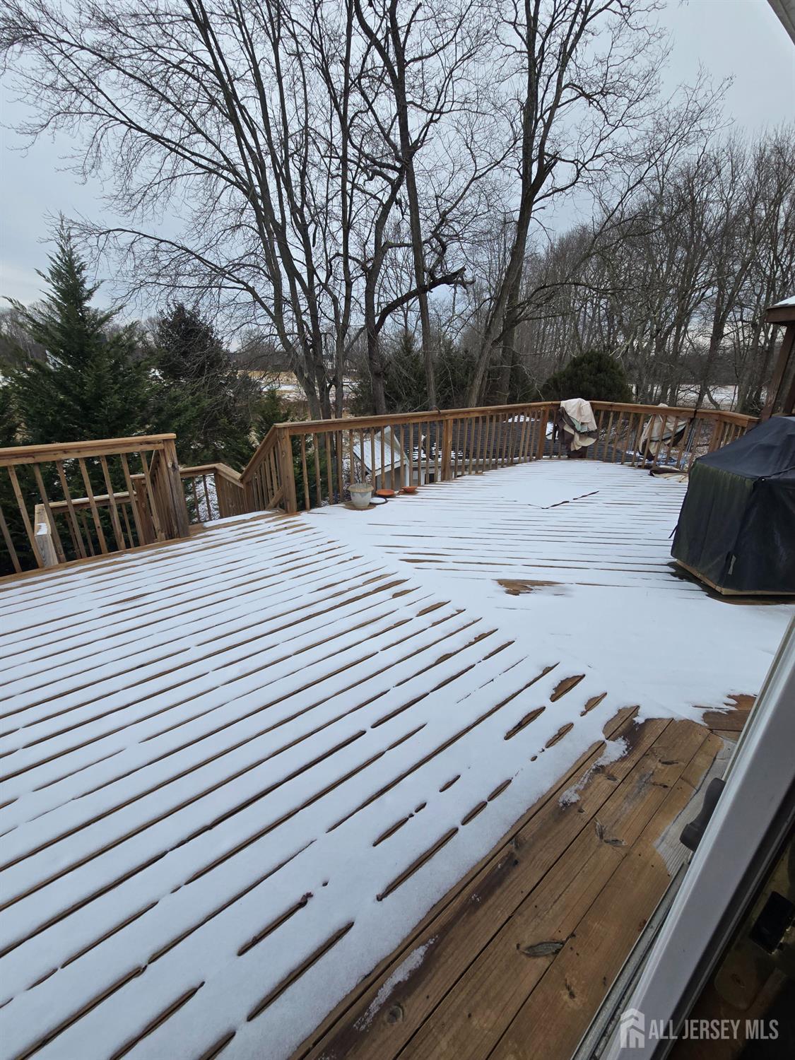 241 Monmouth Road Freehold, NJ 07728 - Photo 24 of 30 a view of backyard with wooden fence