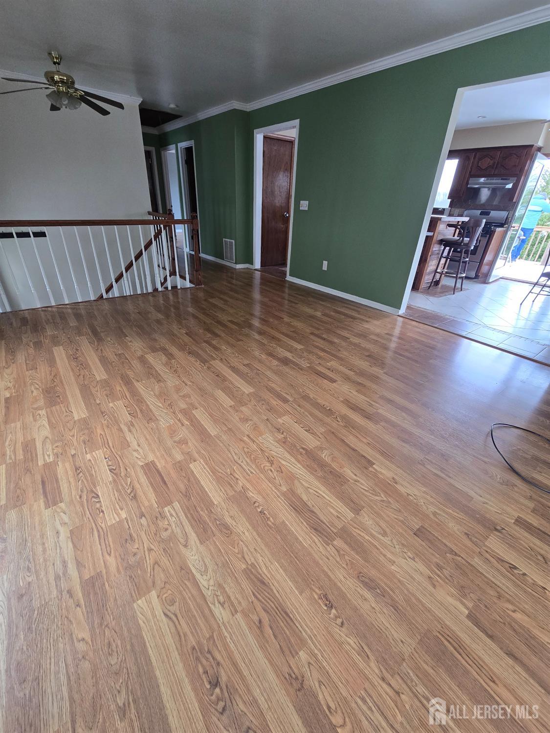 241 Monmouth Road Freehold, NJ 07728 - Photo 25 of 30 a view of a livingroom with wooden floor