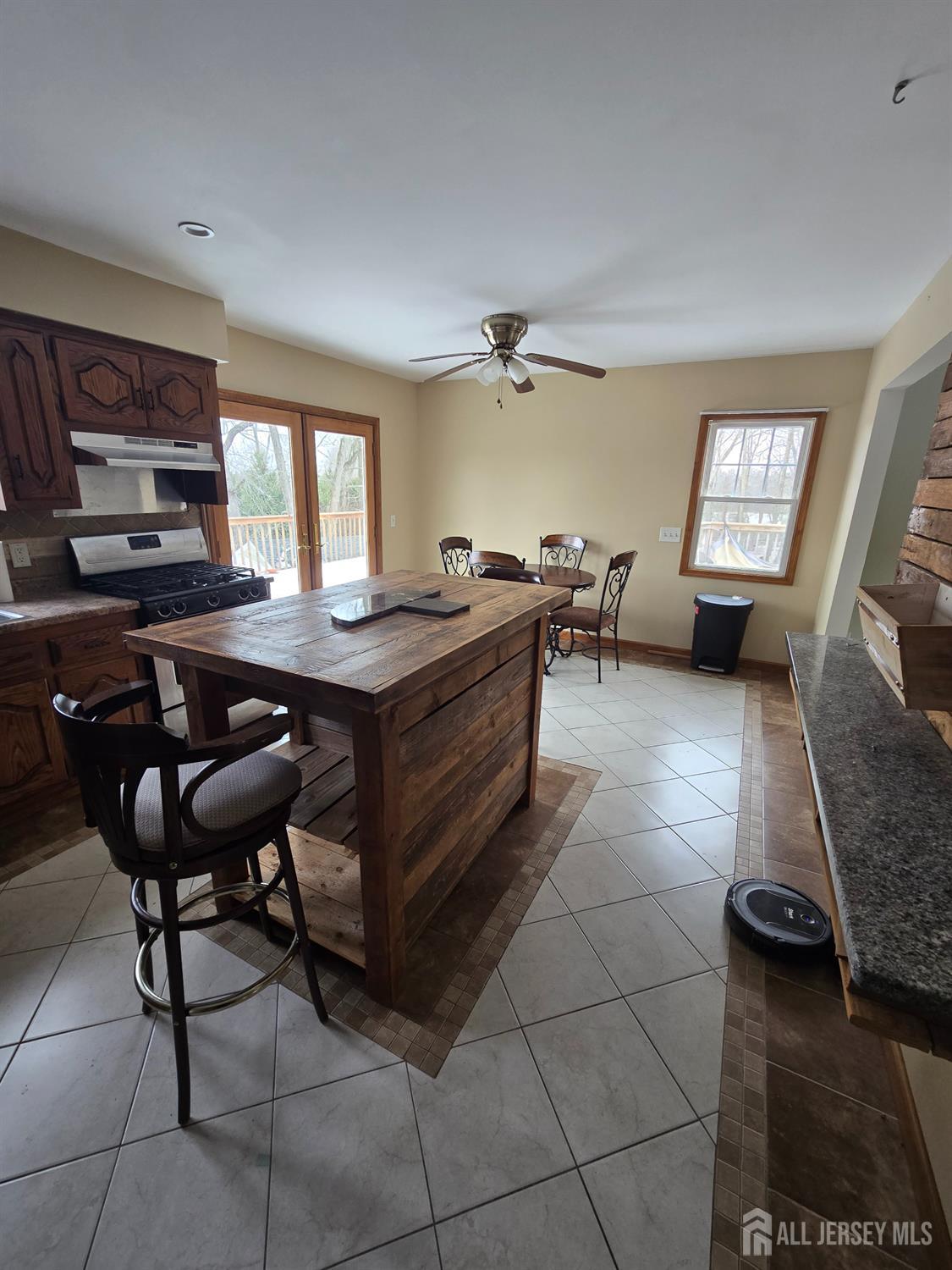 241 Monmouth Road Freehold, NJ 07728 - Photo 10 of 30 a dining room with a table and chairs