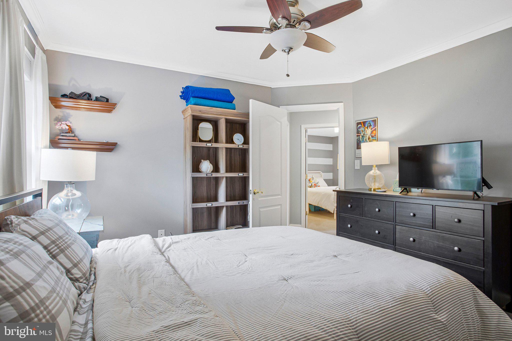 1582 Snug Harbor Road Shady Side, MD 20764 - Photo 39 of 53 Cozy bedroom with modern charm.