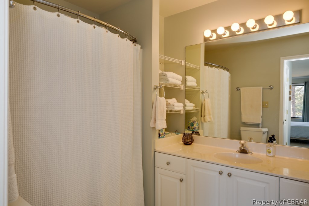 63 Mariners Point Lane, Unit A Hartfield, VA 23071 - Photo 15 of 29 Ensuite master bath with lots of storage