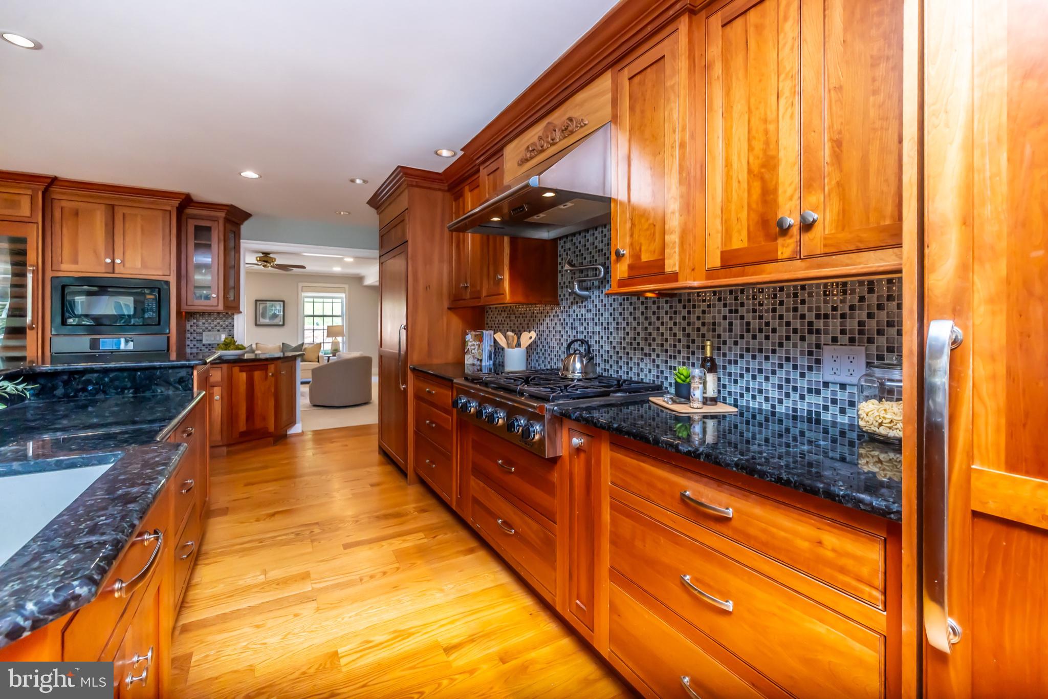 146 Logtown Road Media, PA 19063 - Photo 21 of 128 Under cabinet lighting in sleek granite kitchen.