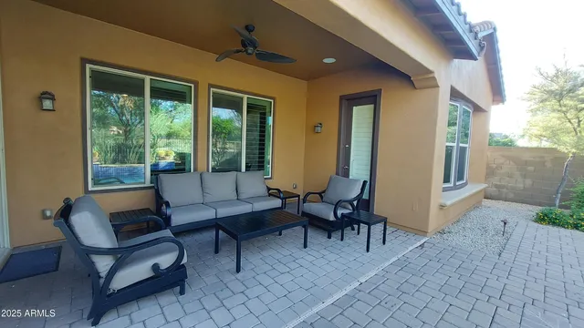 a bedroom with bed and a window