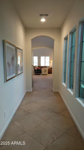 a bedroom with a bed and dresser