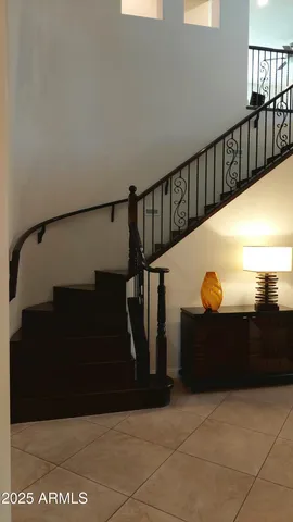 a view of a livingroom with furniture and a window