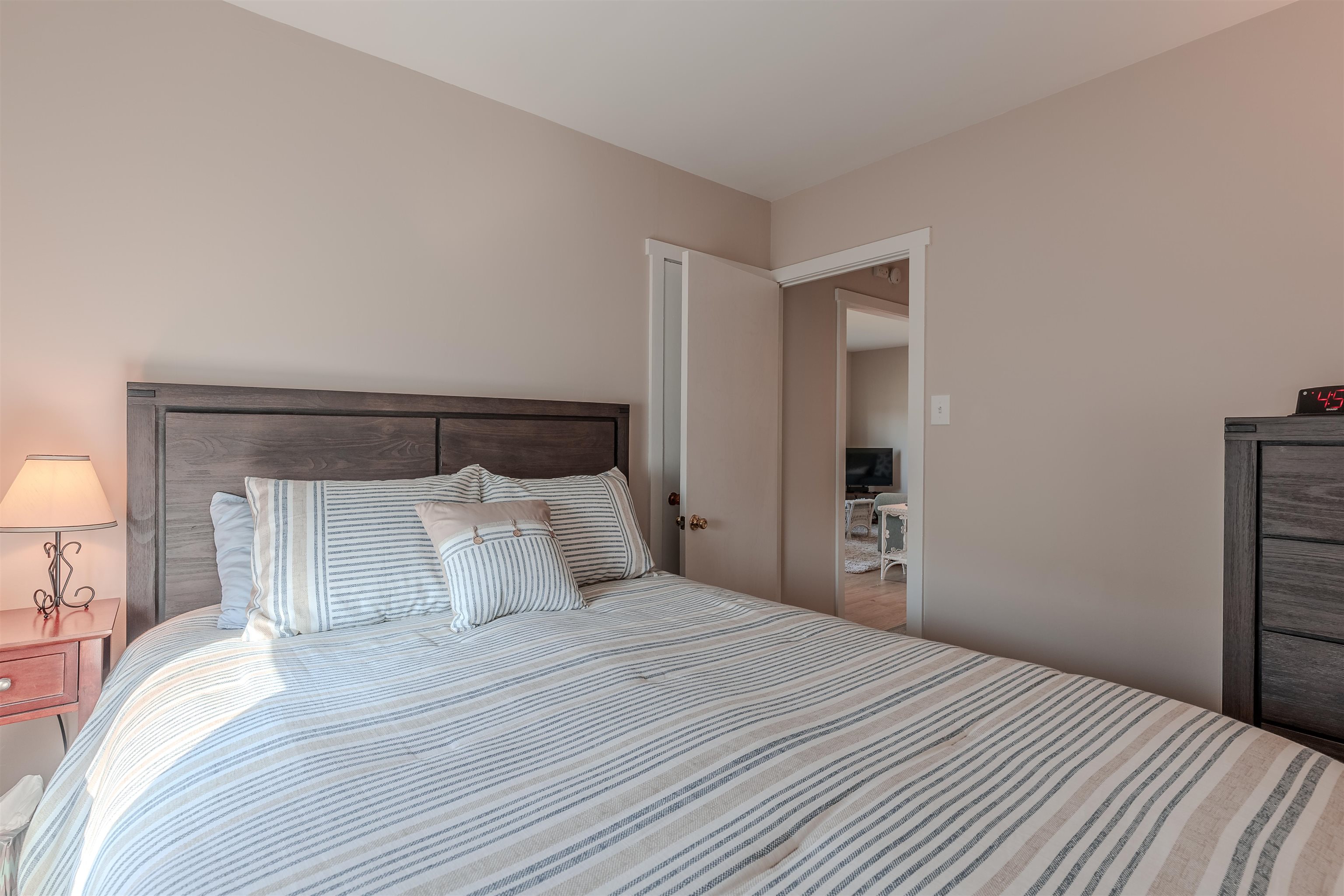 34 Holiday Road Villas, NJ 08251 - Photo 14 of 44 a bedroom with a bed and a mirror