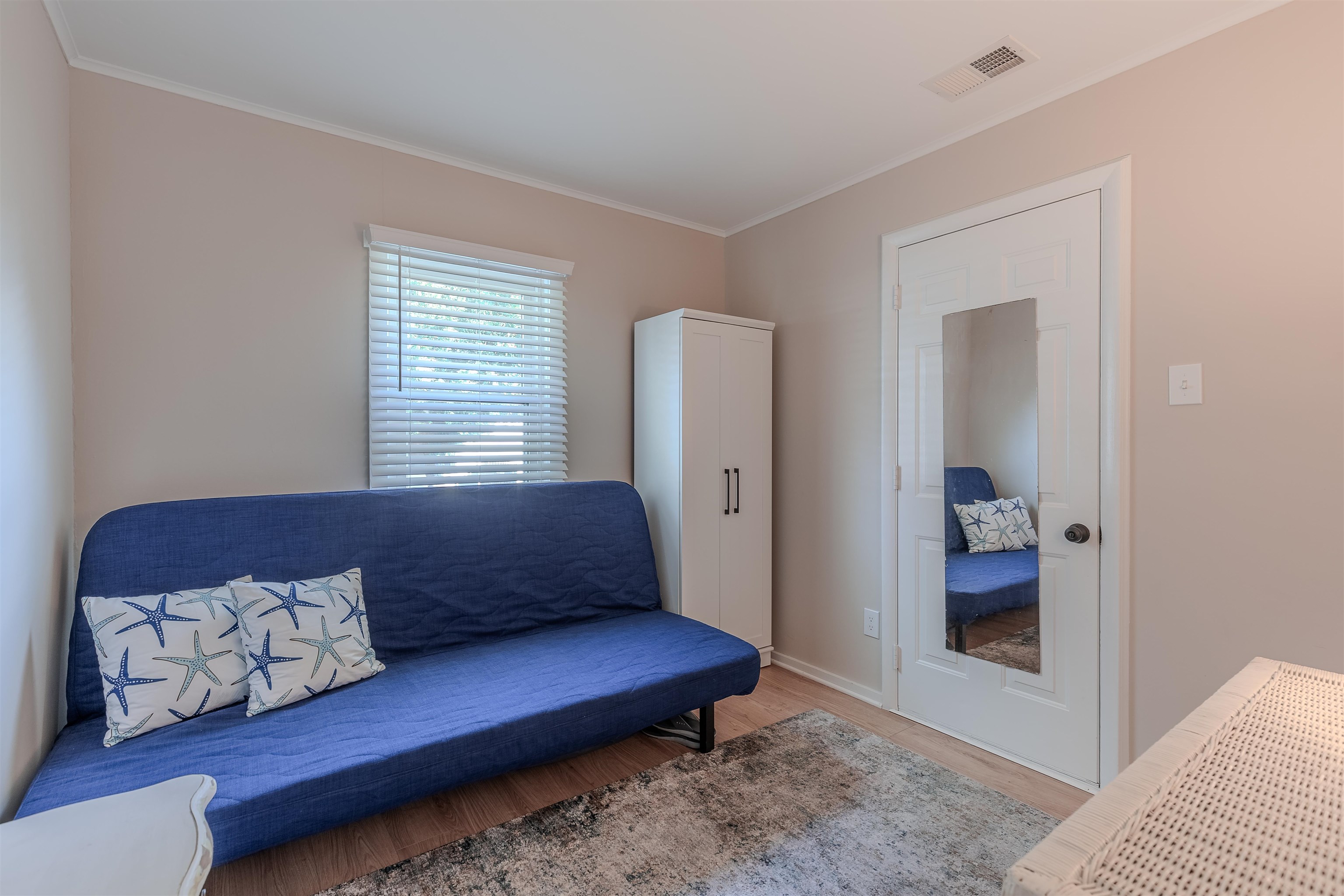 34 Holiday Road Villas, NJ 08251 - Photo 20 of 44 a living room with a couch and a window