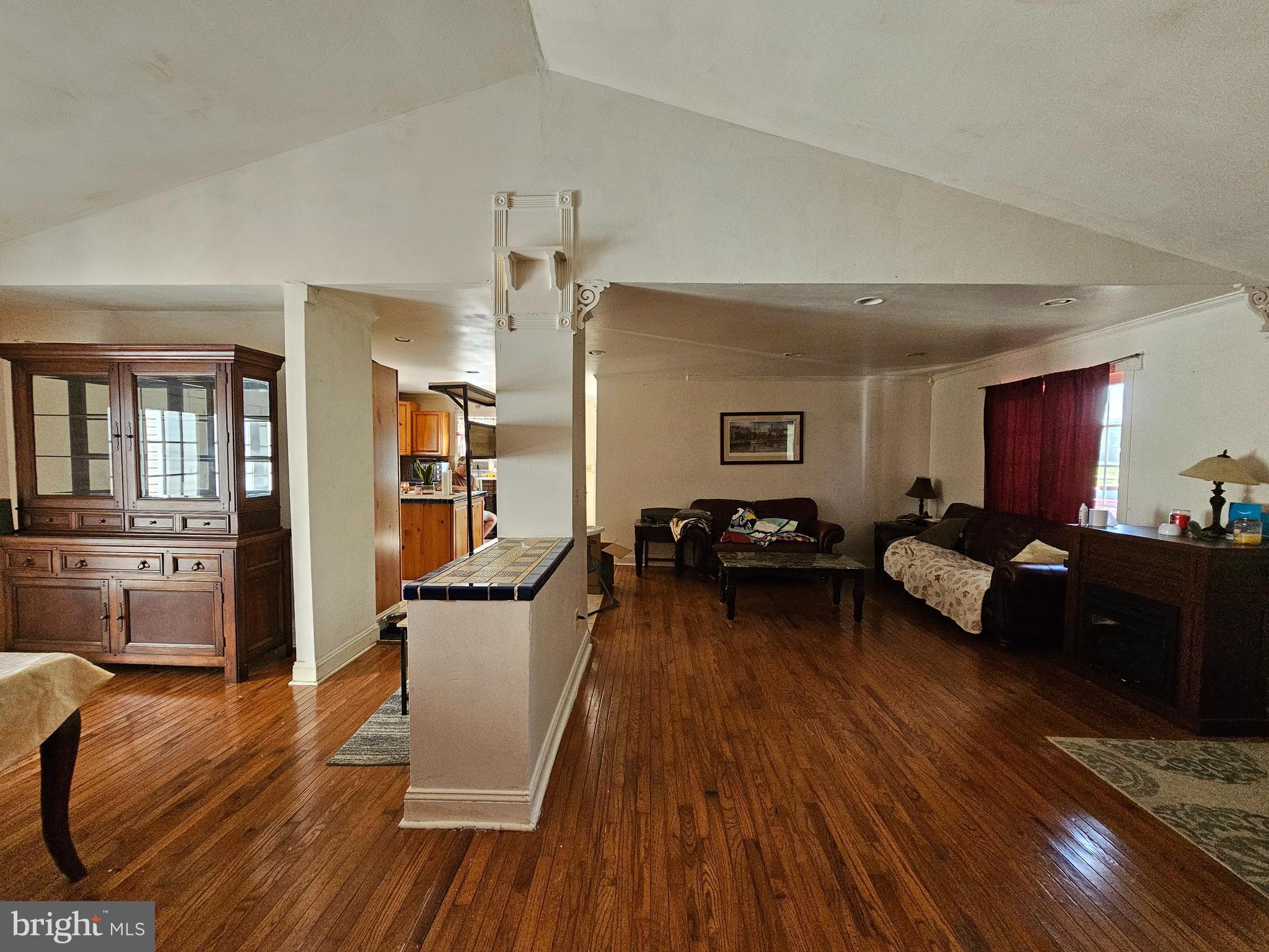 8909 Arden Station Road Westover, MD 21871 - Photo 20 of 32 a living room with furniture and a wooden floor