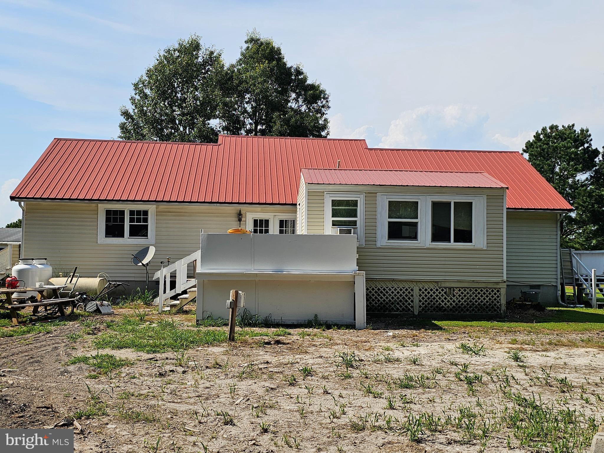 8909 Arden Station Road Westover, MD 21871 - Photo 21 of 32 a front view of a house with garden