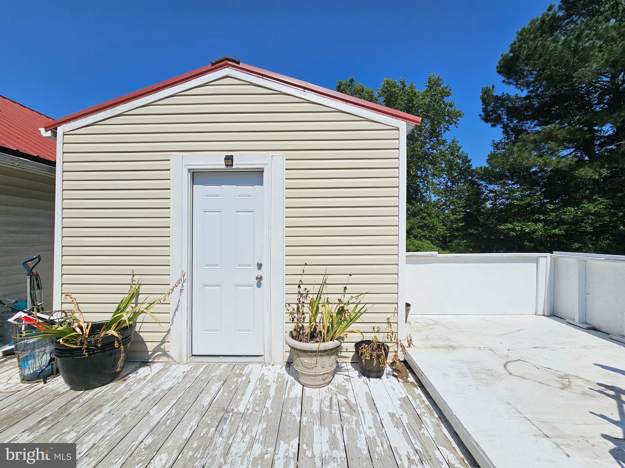 8909 Arden Station Road Westover, MD 21871 - Photo 23 of 32 a view of a two chairs in patio