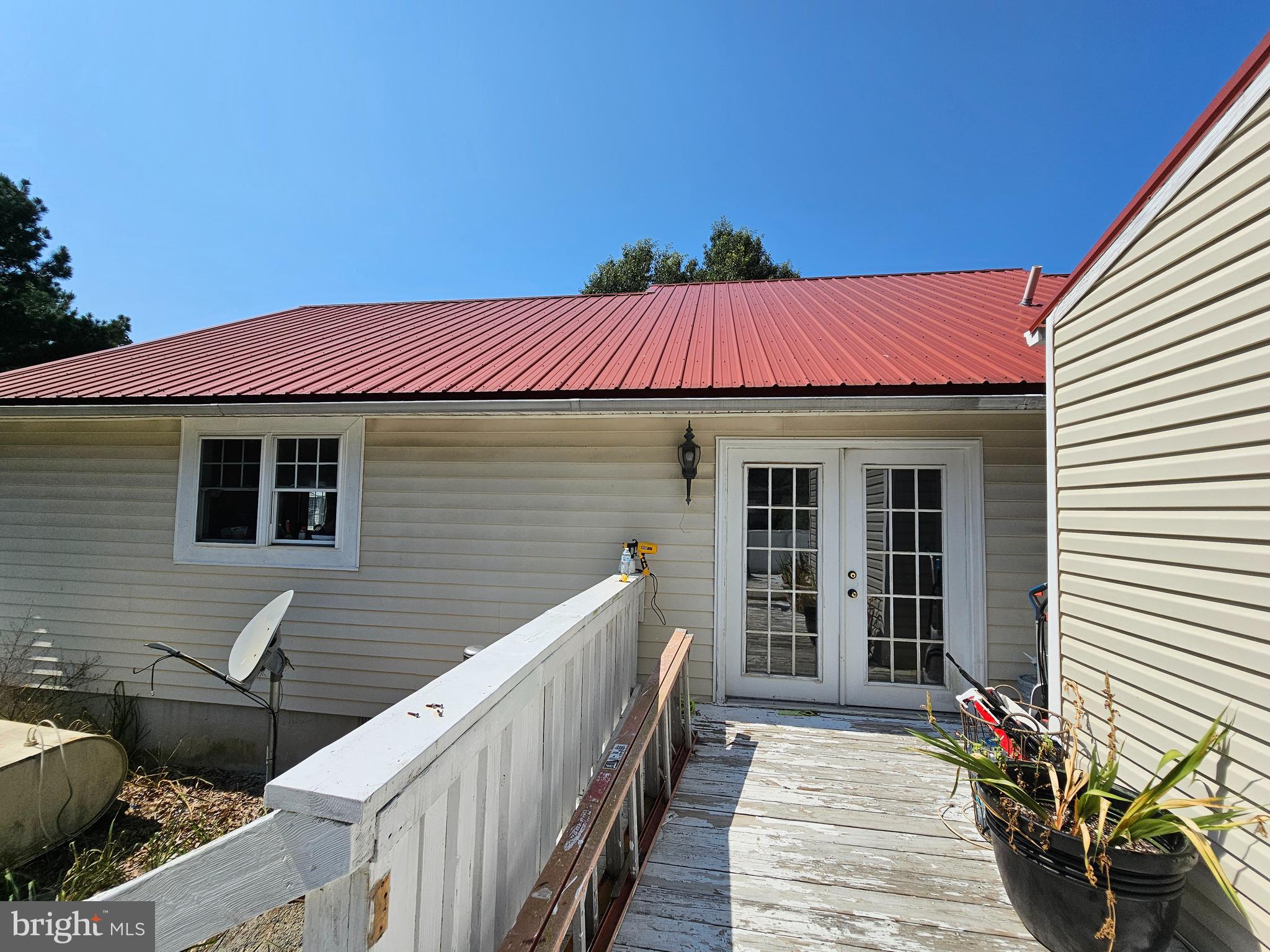 8909 Arden Station Road Westover, MD 21871 - Photo 24 of 32 a view of a house with a patio