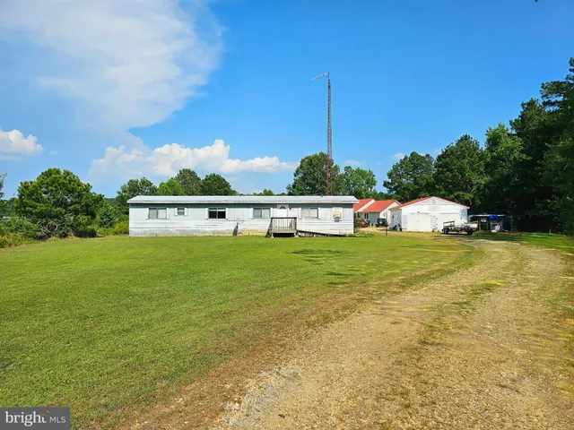 a view of house with outdoor space