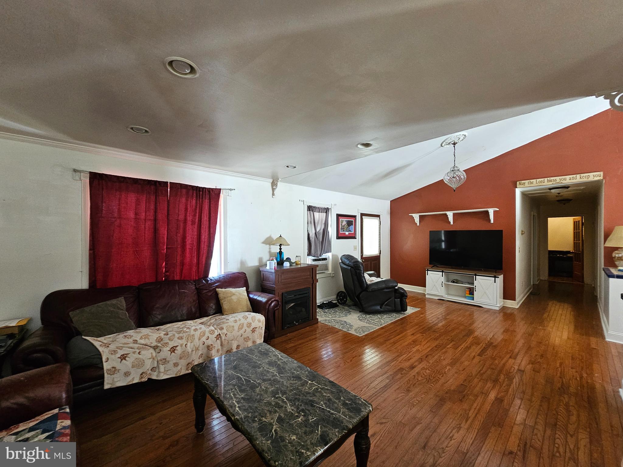 8909 Arden Station Road Westover, MD 21871 - Photo 4 of 32 a living room with furniture and a flat screen tv
