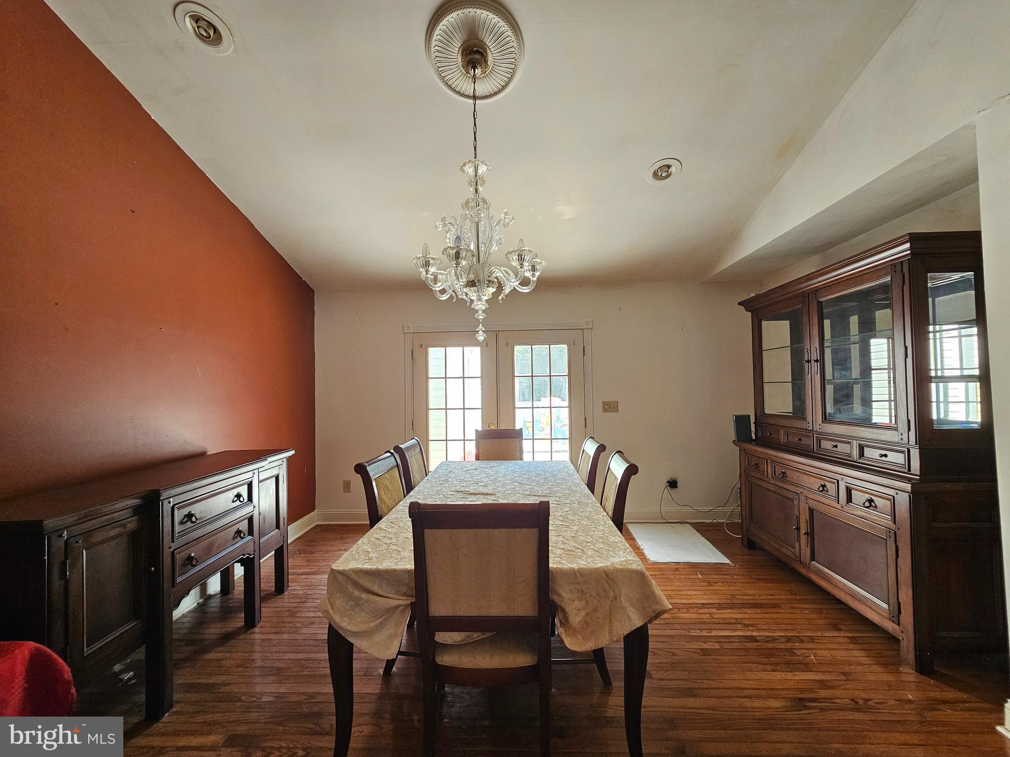 8909 Arden Station Road Westover, MD 21871 - Photo 7 of 32 a view of a dining room with furniture window and wooden floor