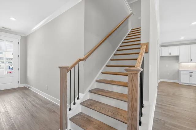 a view of entryway with wooden floor