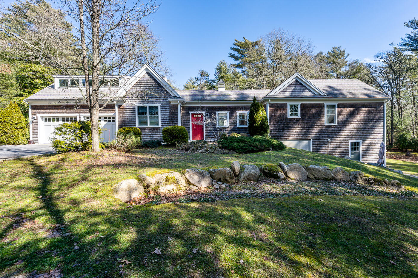 125 Woodside Road West Barnstable, MA 02668 - Photo 4 of 58 a front view of a house with a yard