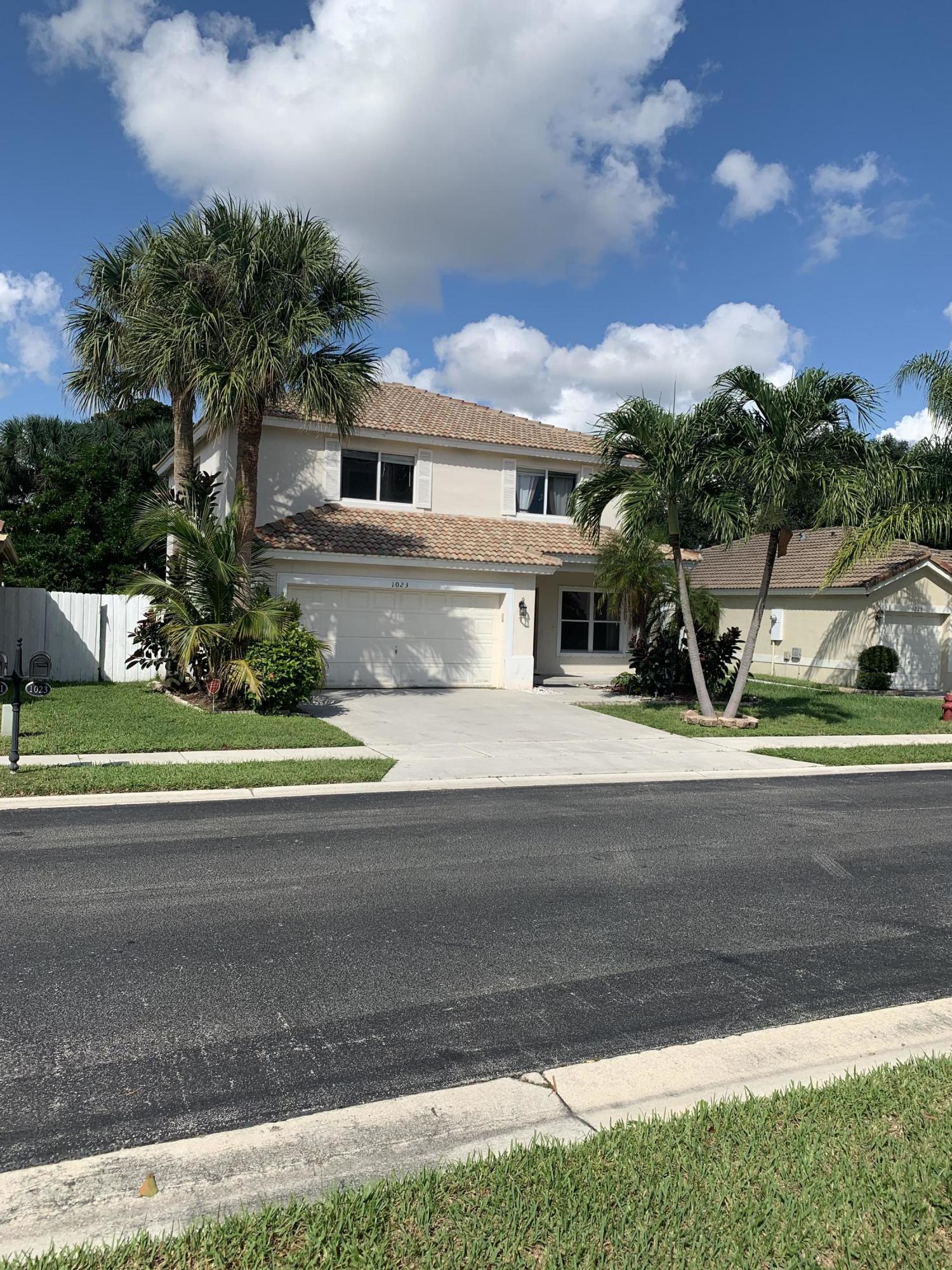 1023 Fosters Mill Road Boynton Beach, FL 33436 - Photo 2 of 22 Front