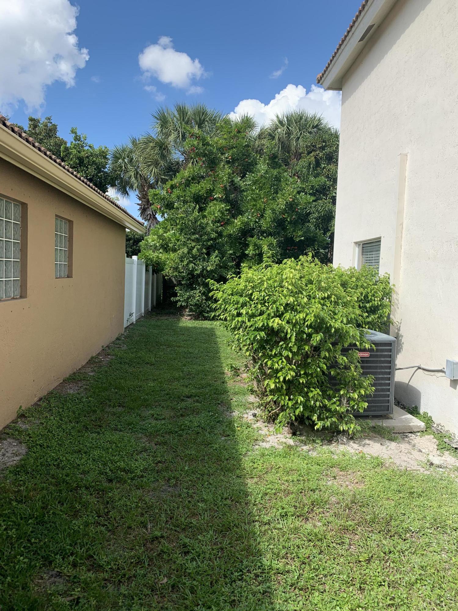 1023 Fosters Mill Road Boynton Beach, FL 33436 - Photo 21 of 22 Side of House