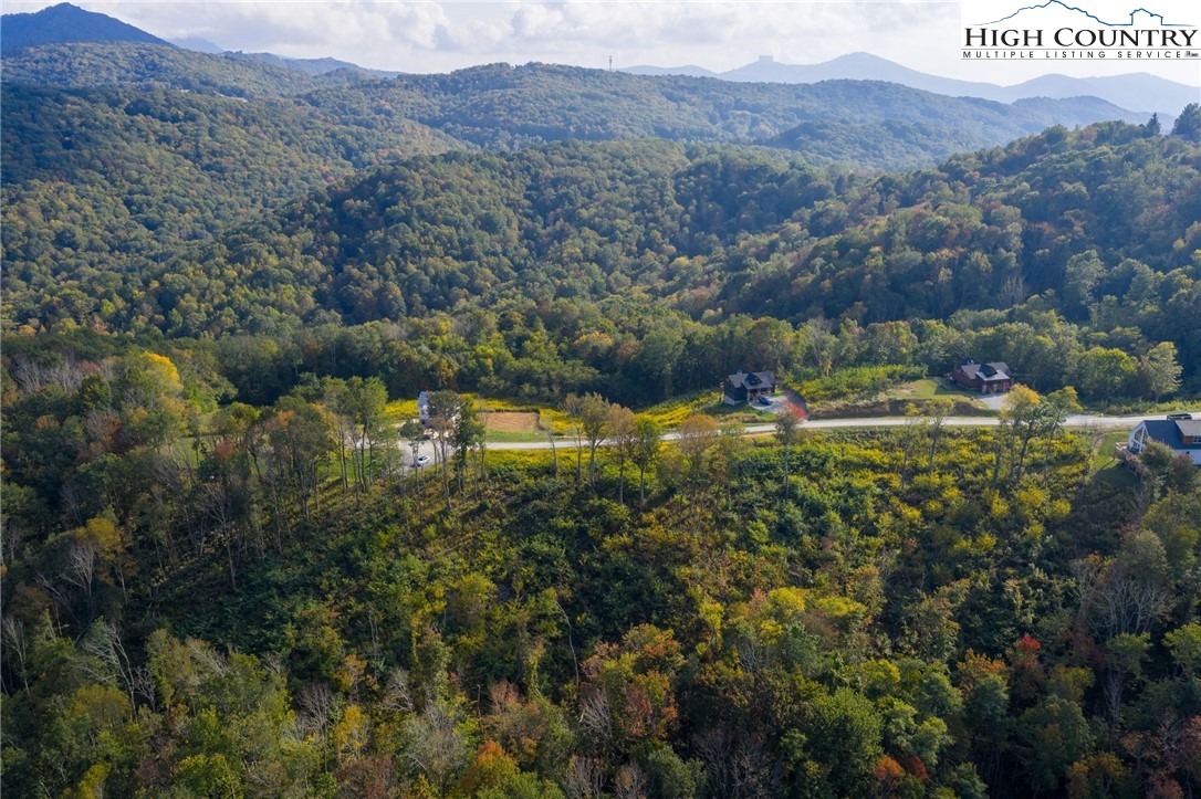 146 Banner Road Southwest Banner Elk, NC 28604 - Photo 15 of 22 a view of lake with mountain