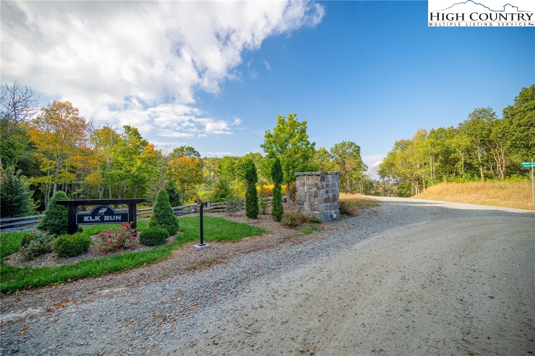 146 Banner Road Southwest Banner Elk, NC 28604 - Photo 16 of 22 a view of a road with a house in the background
