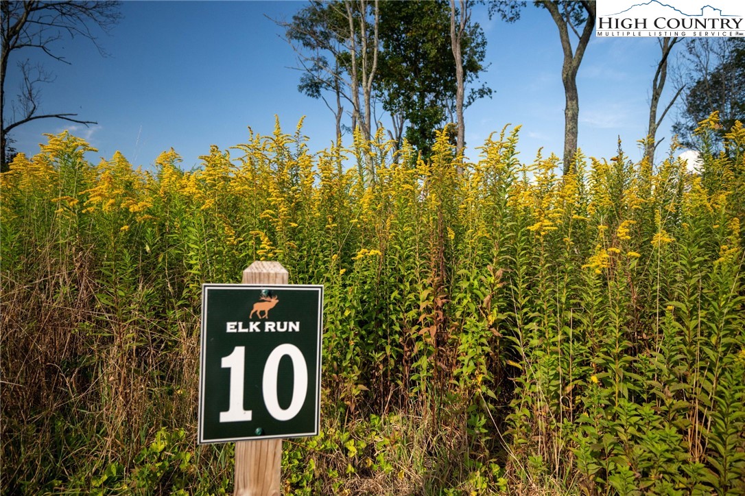 146 Banner Road Southwest Banner Elk, NC 28604 - Photo 17 of 22 a street sign that is sitting in front of a building