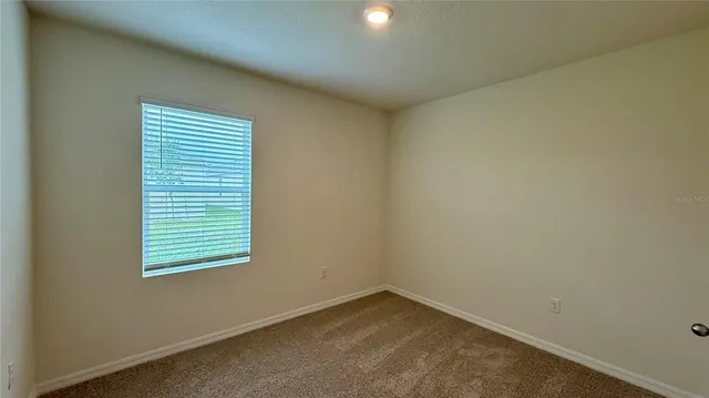 an empty room with a window