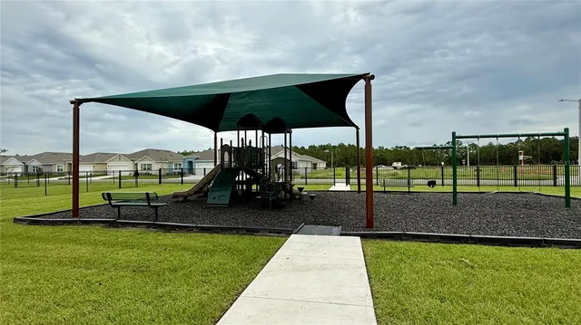 a view of a park with slide