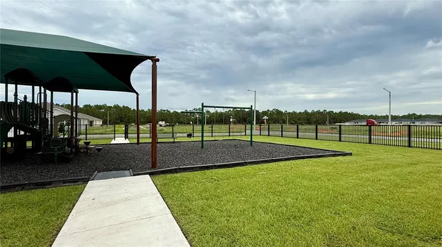 a view of a park with slide