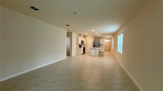 a view of a livingroom with a flat screen tv
