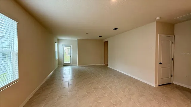 a view of empty room with window