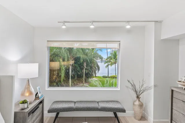 a view of a swimming pool with a yard