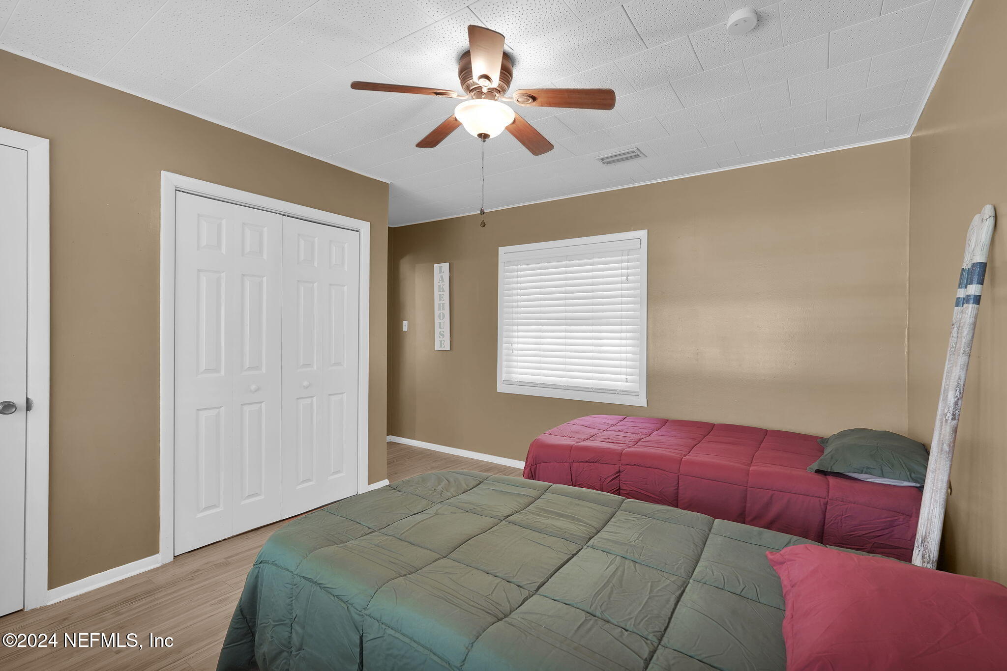 25 Forest Street Keystone Heights, FL 32656 - Photo 17 of 22 a bedroom with a bed furniture and a window