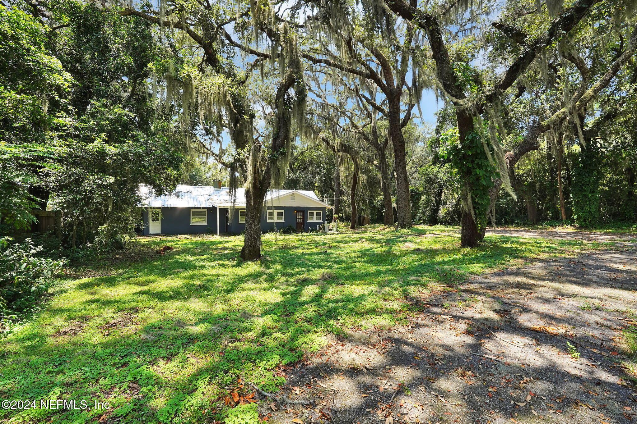 25 Forest Street Keystone Heights, FL 32656 - Photo 2 of 22 a front view of a house with a yard
