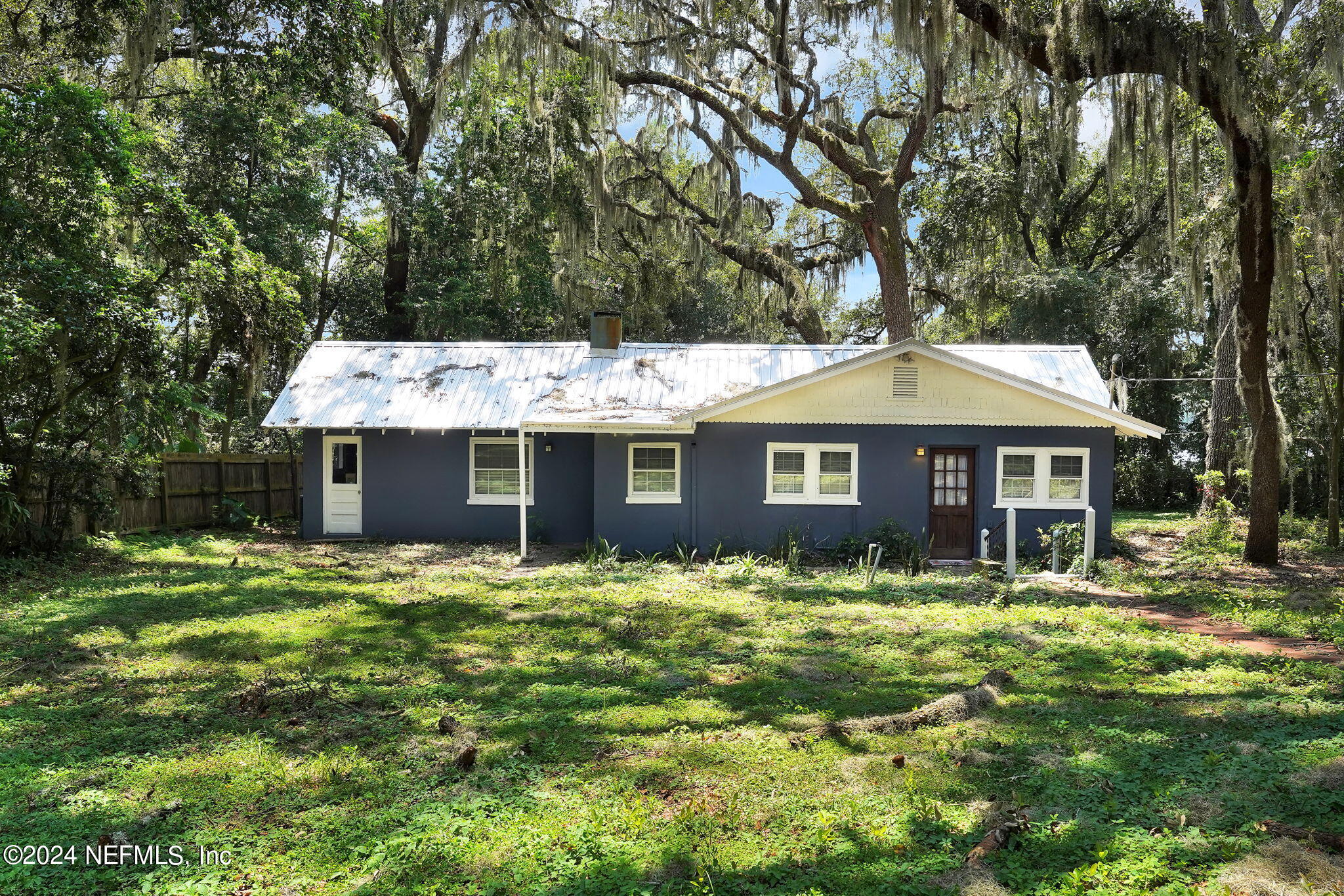 25 Forest Street Keystone Heights, FL 32656 - Photo 3 of 22 a front view of a house with yard