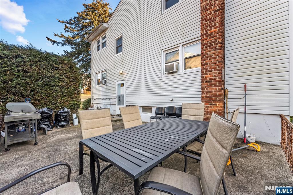 1 Dunn Road West Orange, NJ 07052 - Photo 20 of 20 a view of a patio with table and chairs and couches